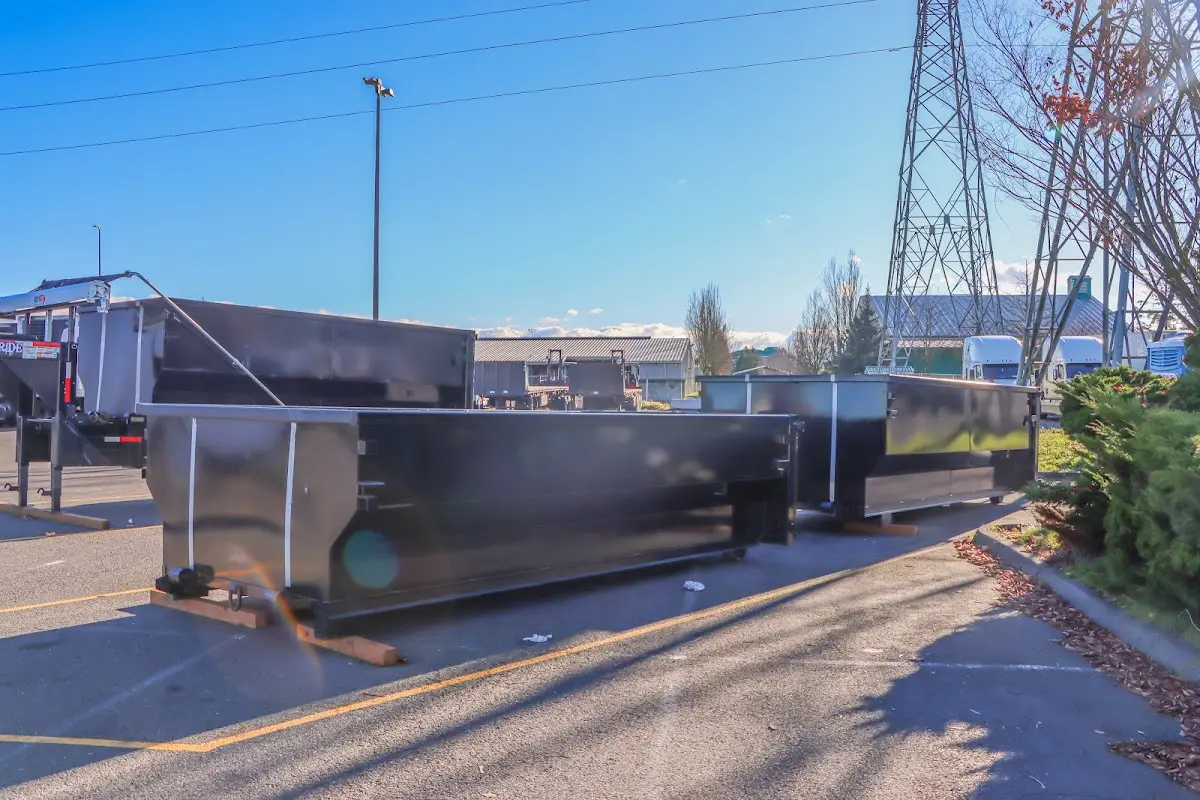 Roll-off dumpster ready for waste disposal at job site for 2 Yard Dumpster Rental in Dickson
